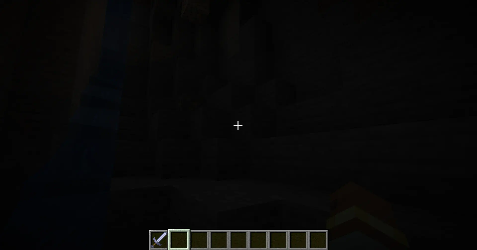 The same cave environment in minecraft with a player not holding the sword, the cave is now dark