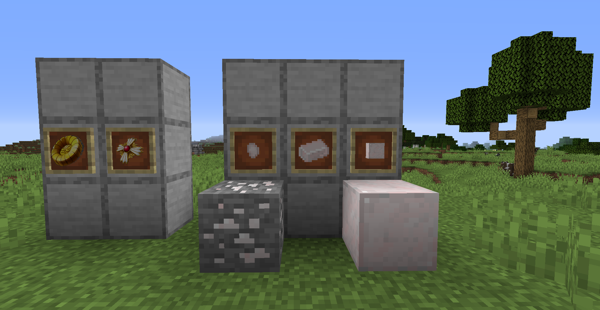 A silver nugget, a silver ingot and a silver block in the item_farme on the wall. And a silver ore block and a silver block both on the ground. They're white.