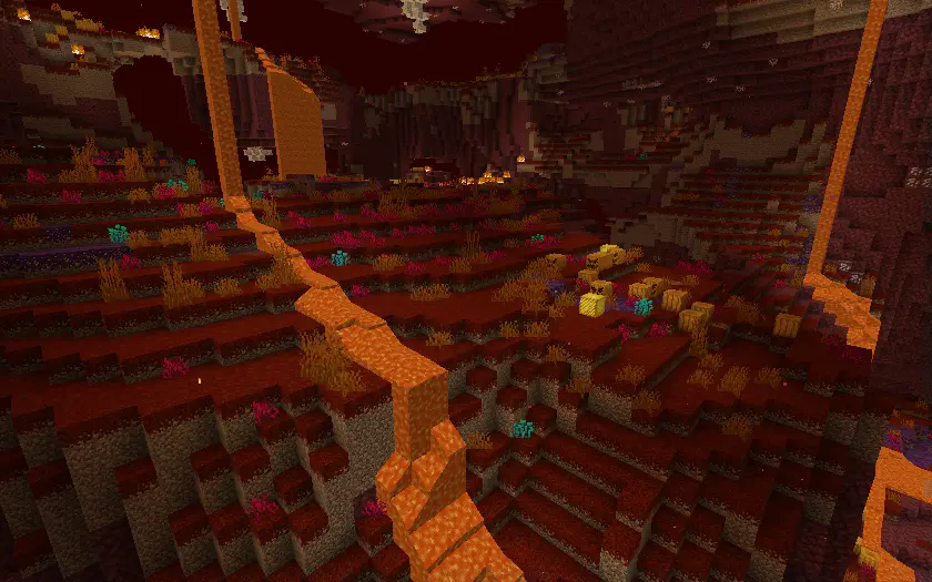 An area of the Nether covered in reddish grass and fel pumpkins.