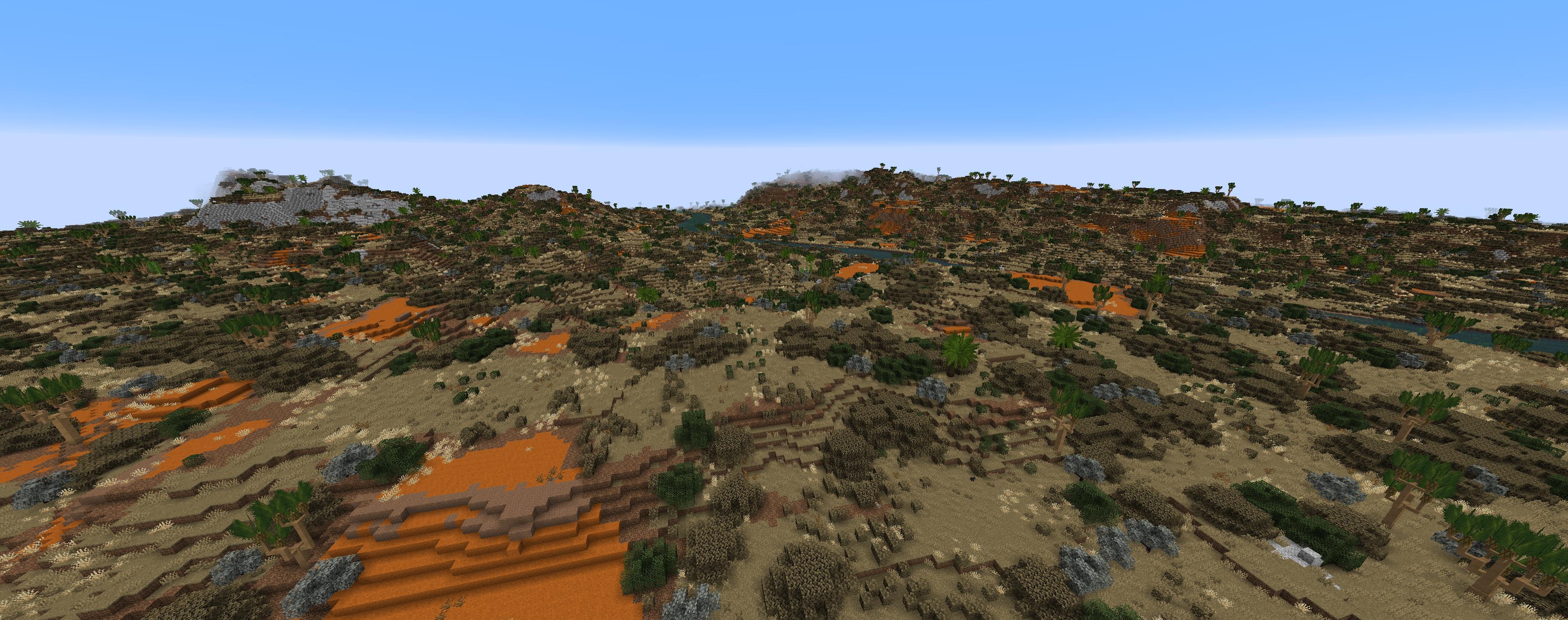Dense low vegetation with sporadic prickly trees
