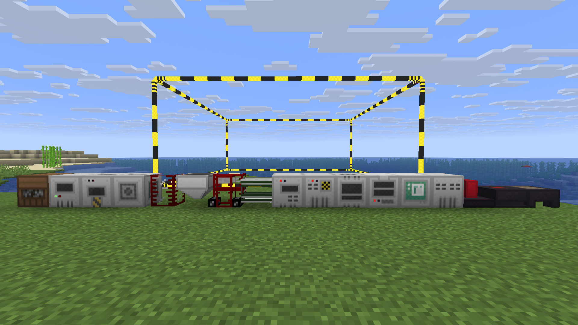 A row of various industrial machines and blocks from the BuildCraft mod placed side-by-side in a Minecraft world
