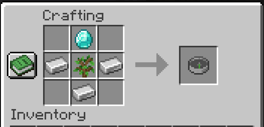 a diamond in top row middle, iron ingot & oak sapling & iron ingot, lastly another iron ingot bottom row middle