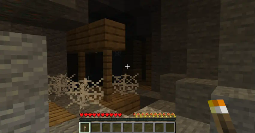 A player in front of a Mineshaft