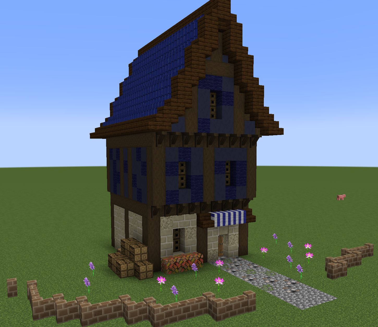 A house built using new blocks such as Blue Roof Tiles and Limestone Bricks