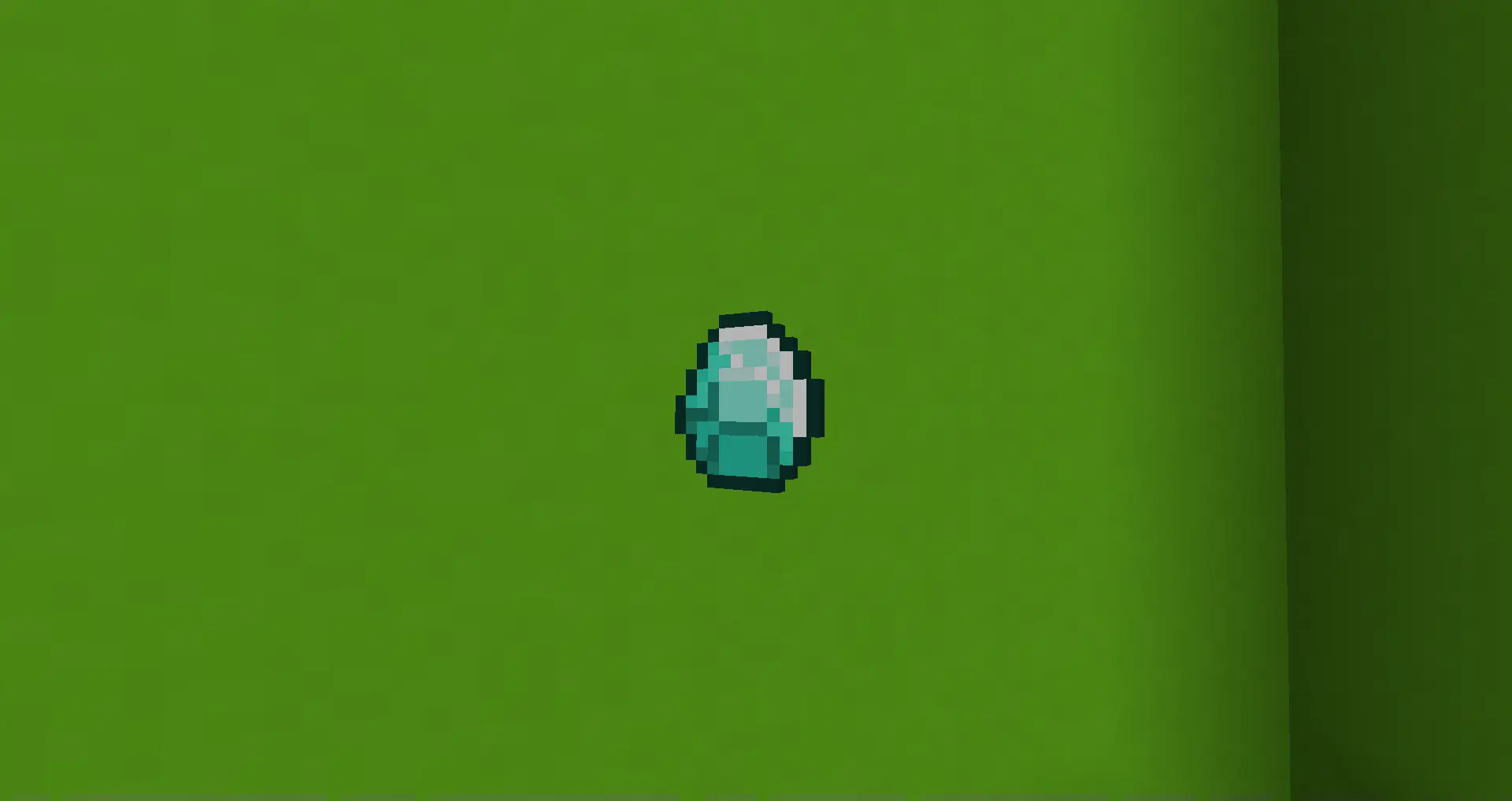 Blue egg, retextured to a diamond, in front of a lime green concrete background