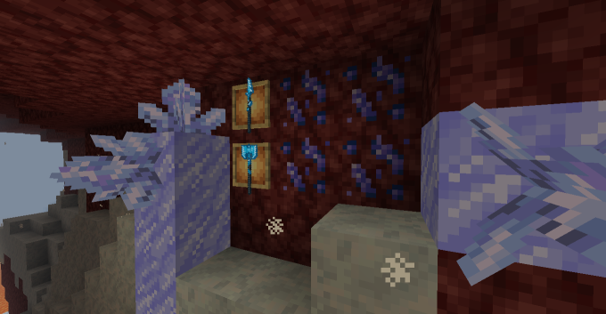 Sapphire ores found in netherrack. Surrounded by glowing ice, with clusters formed on them. And a display of two of the tools crafted from sapphire on the wall.