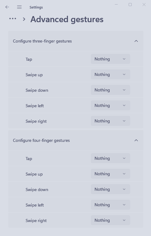 The settings app opened to Bluetooth & devices → "Touchpad" → "Advanced" "gestures." Each drop-down list is set to "nothing."