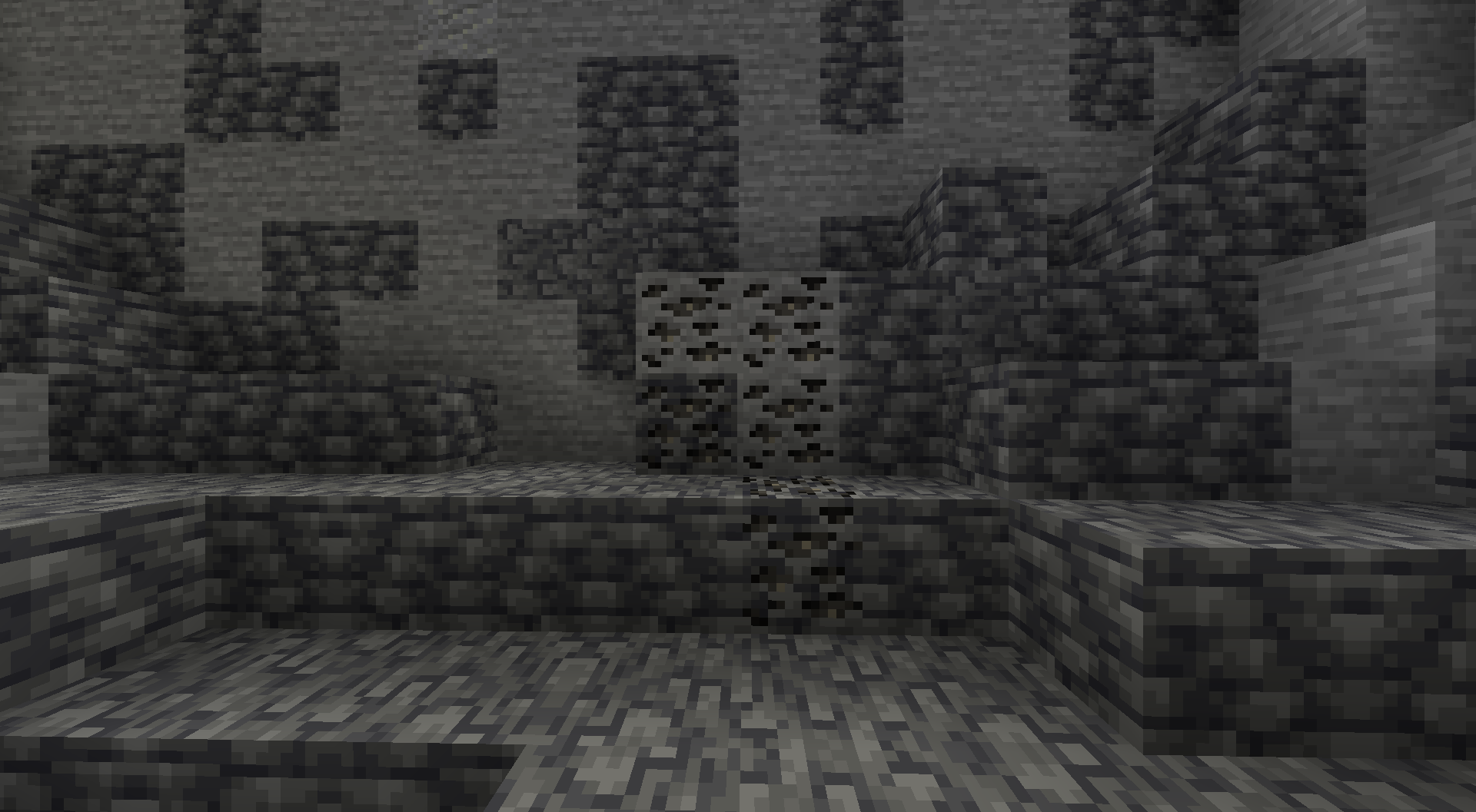 Meteorite ore and deepslate meteorite ore blocks exposed in a cave wall.