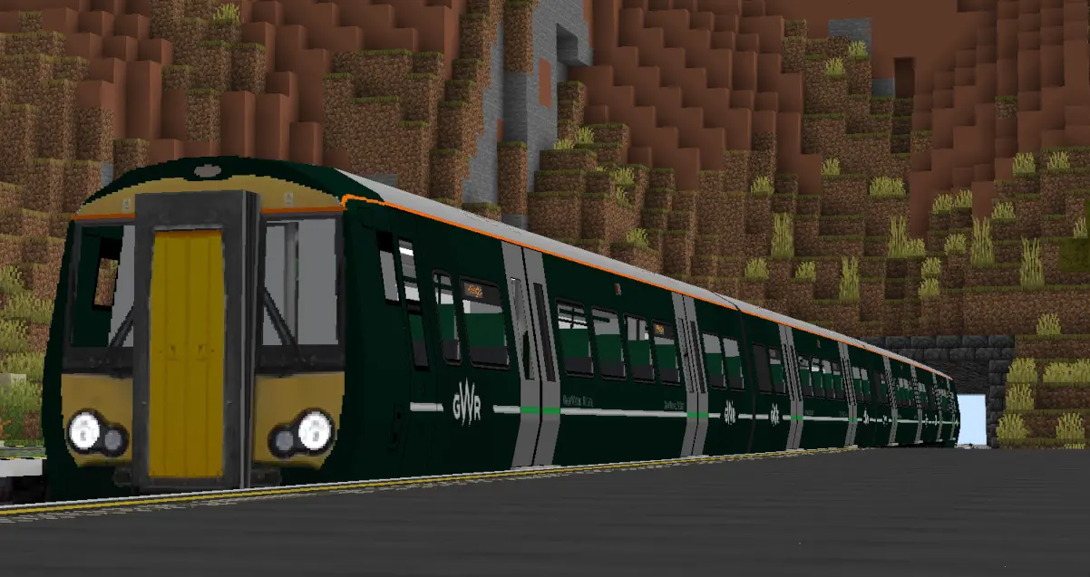 GWR liveried Class 387 stopping at a platform.