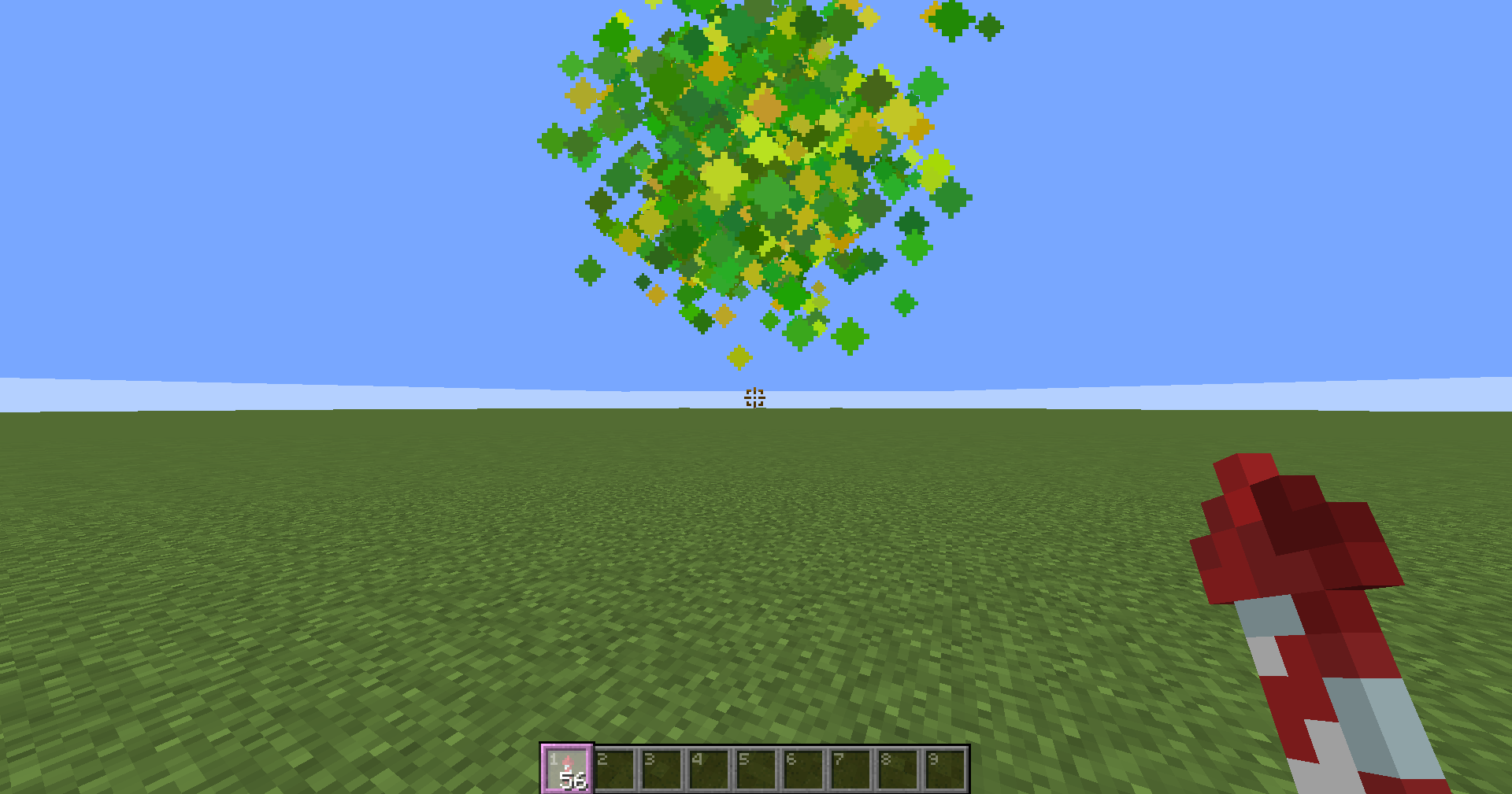 A Minecraft Screenshot of Confetti being shot, using the same particles as the totems of undying