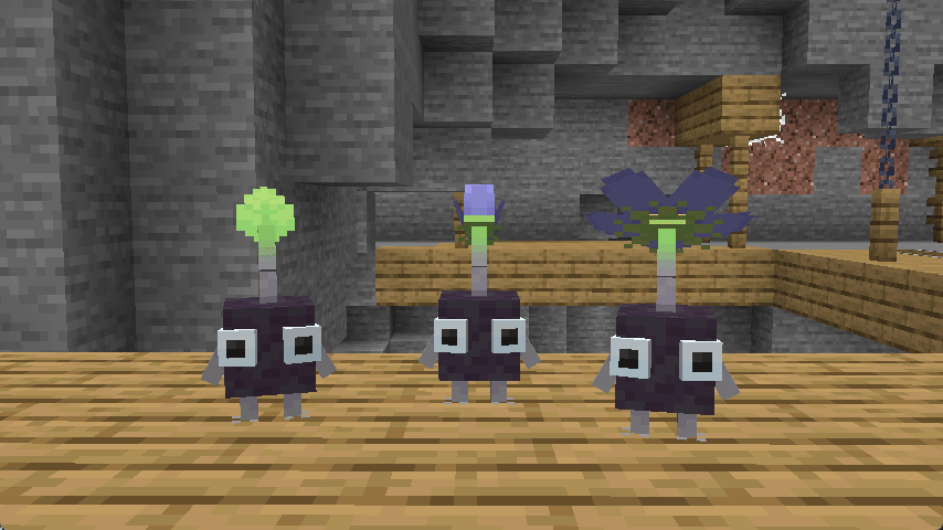 Three rock pikmin lined up in a mineshaft under ground