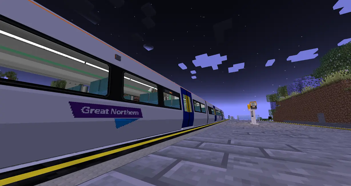 ex c2c GN Class 387 leaves a station