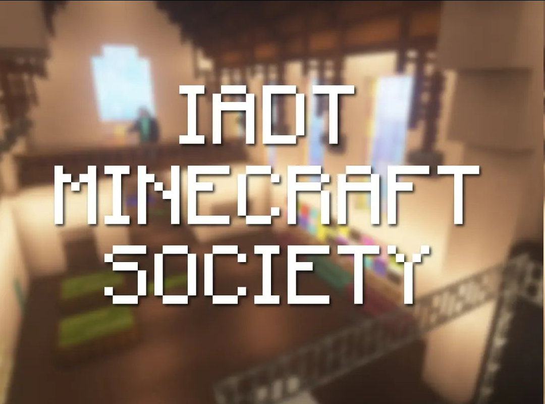 Text that says IADT Minecraft Society, with a blurred background of a Minecraft build