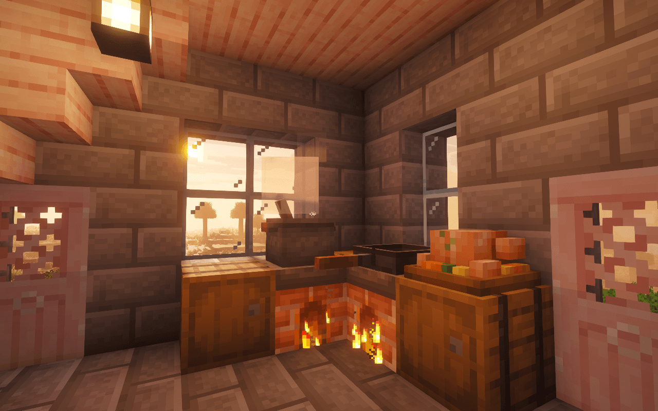 A small kitchen lit by sunset and firelight