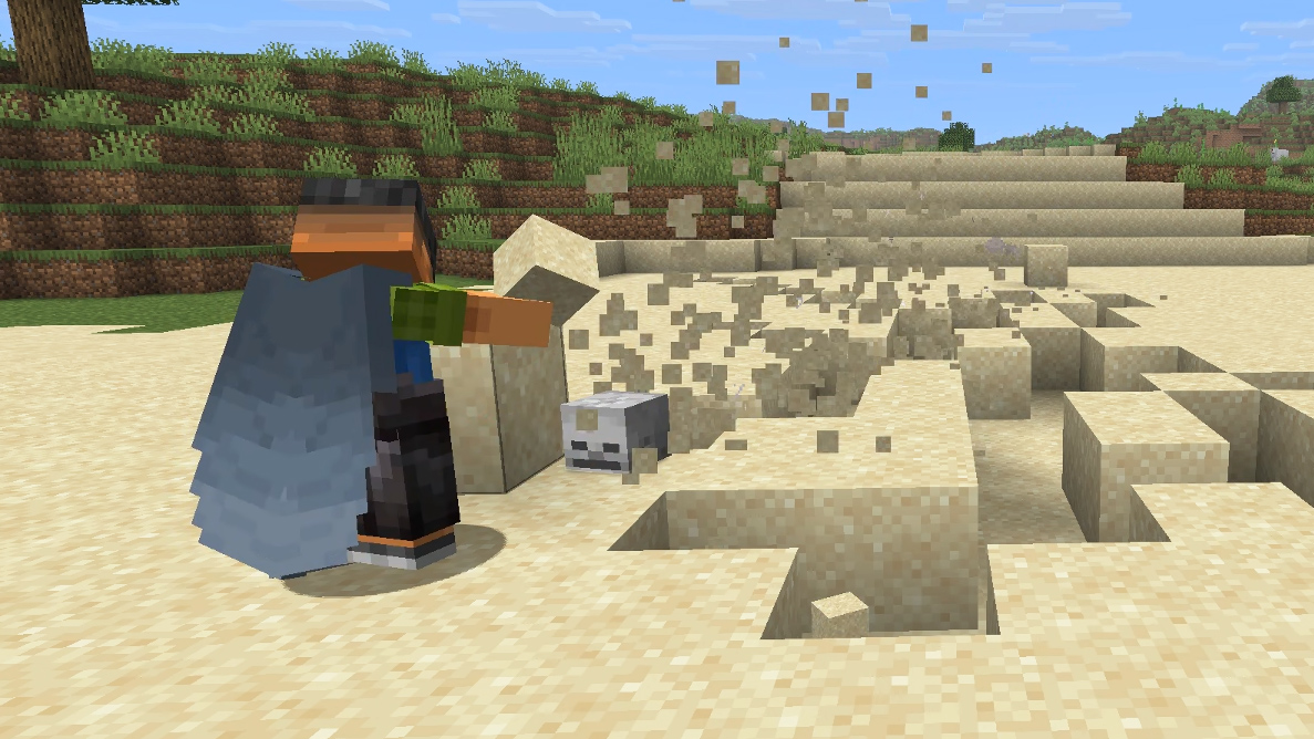 A player stands on a beach holding a sand block and looking down as a charging Beach Yeeter approaches