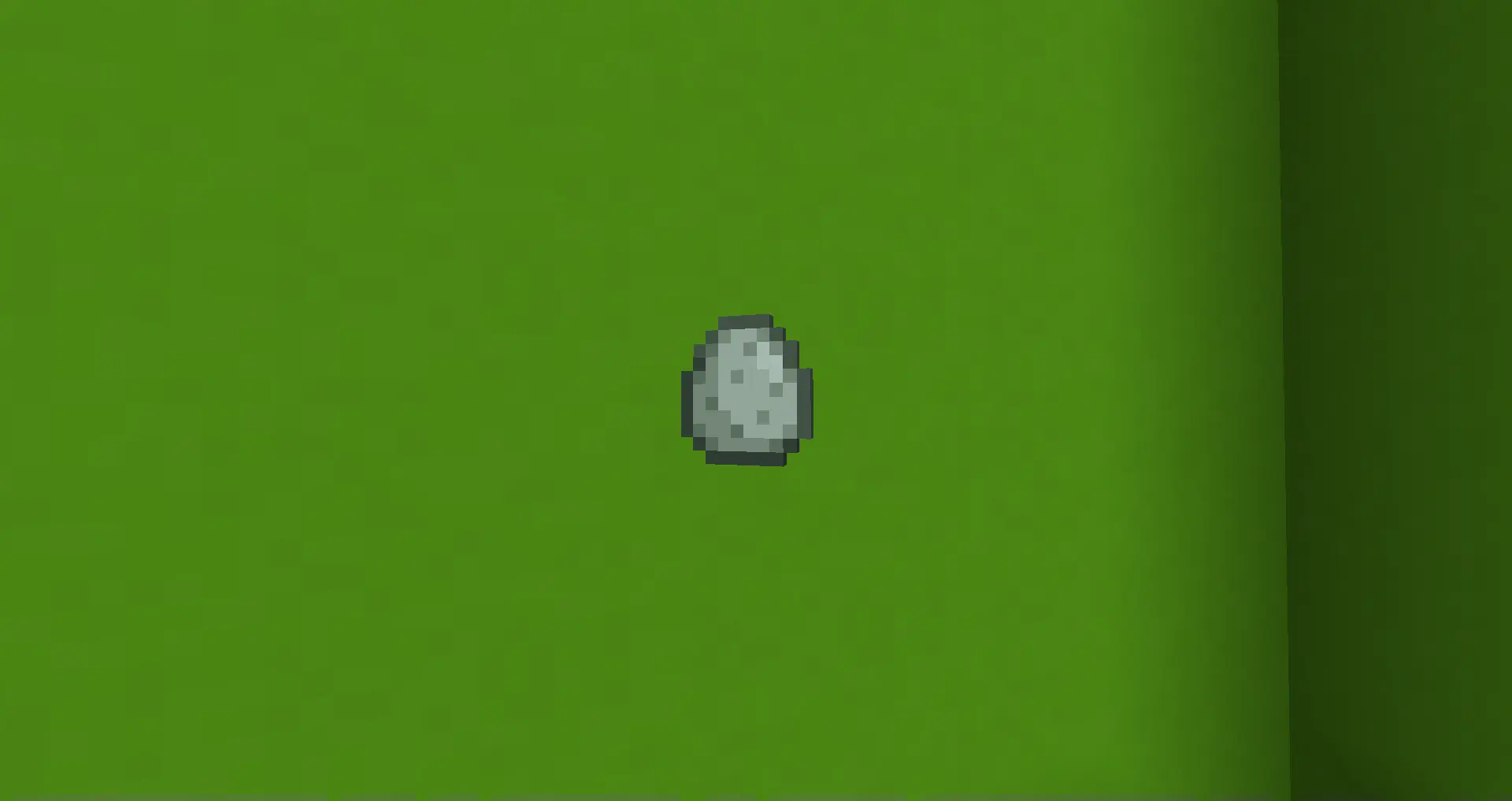 Blue egg, in front of a lime green concrete background