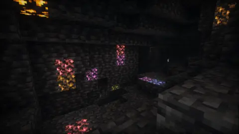 Cave with coloured glow lichen