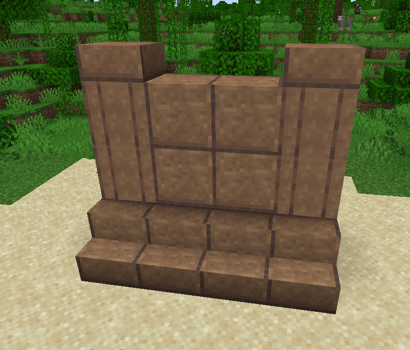 A small, wall-like structure showcasing Polished Mud