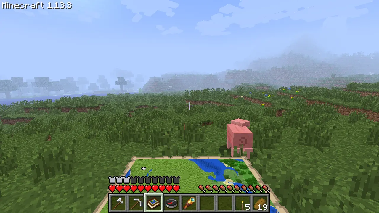 Player holds an atlas while looking around.