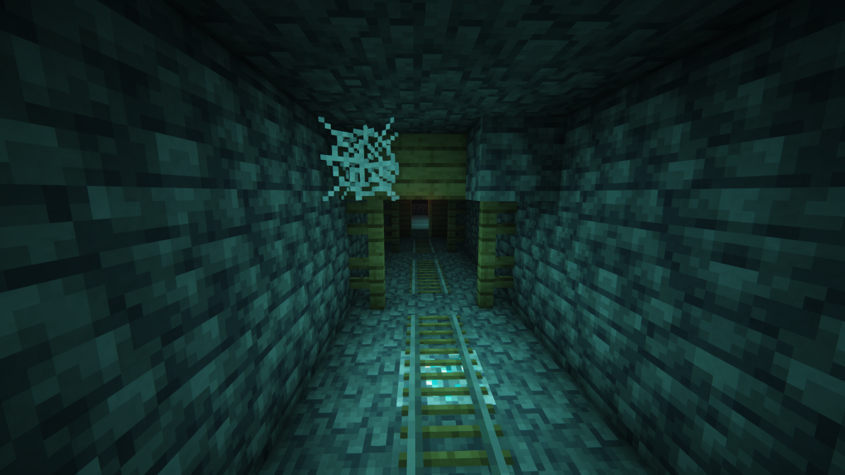 Diamond ore glowing under a rail in a mineshaft.