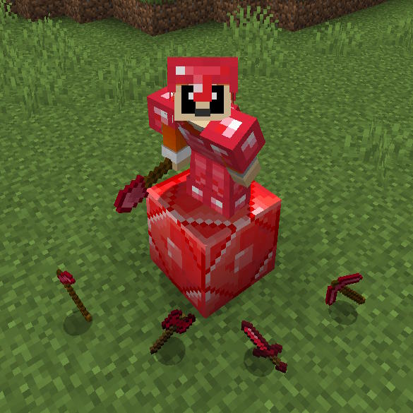 A player in ruby armor standing on a ruby block with ruby tools.