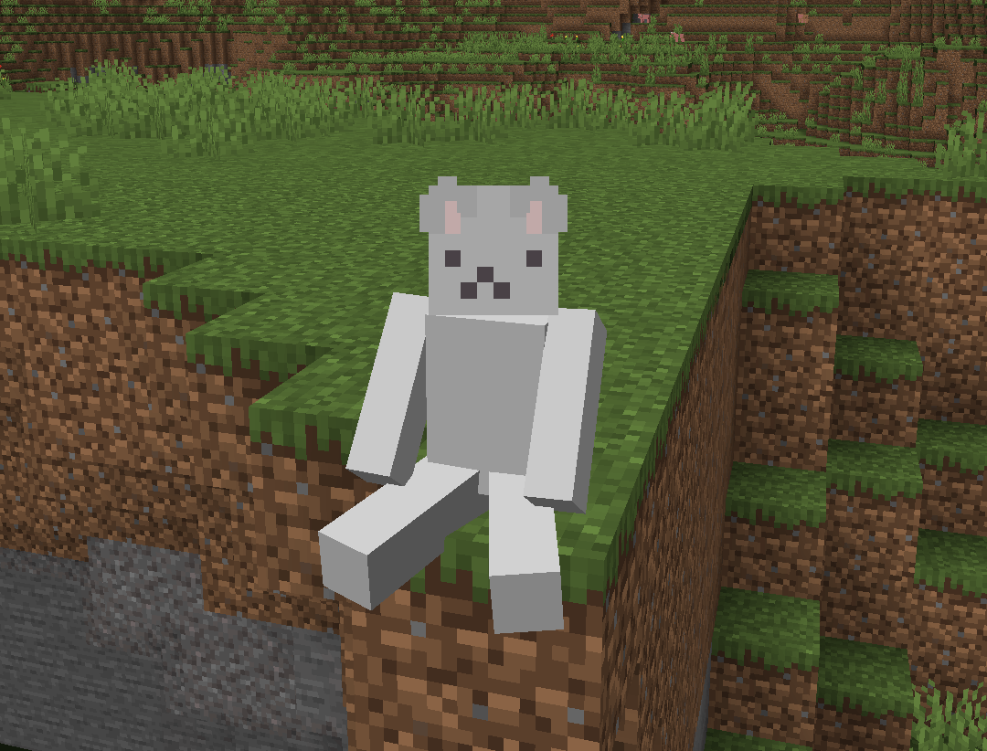 Player sitting on the edge of a cliff looking at the camera
