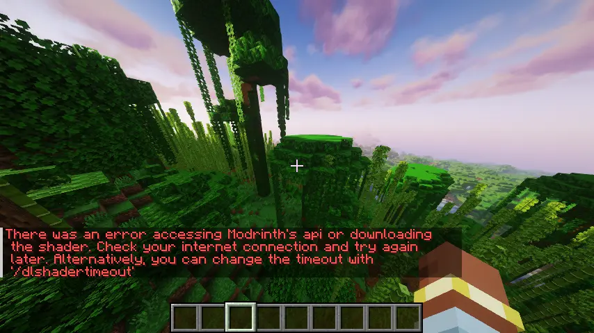 A minecraft world with shaders applied with the text 'There was an error accessing Modrinth's api or downloading the shader. Check your internet connection and try again later. Alternatively, you can change the timeout with '/dlshadertimeout'' in chat