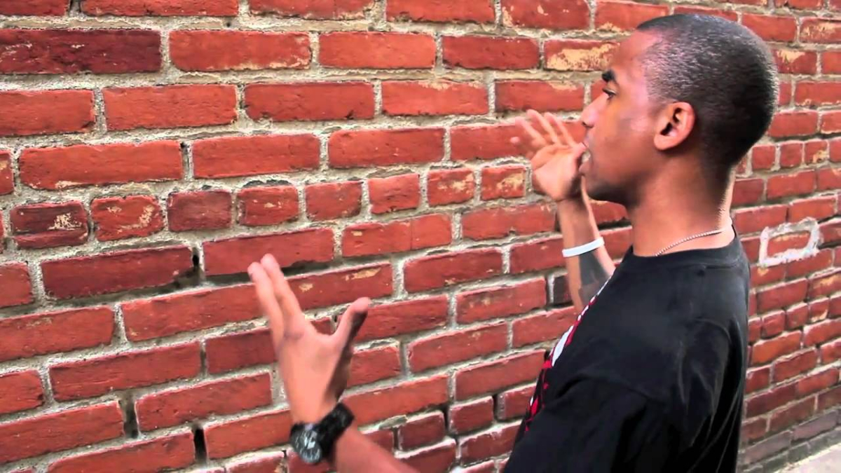 Man talking to a brick wall symbolizing how i feel uploading these updates