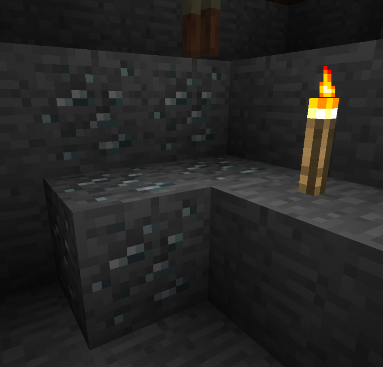 A screenshot of silver ore underground in the overworld.