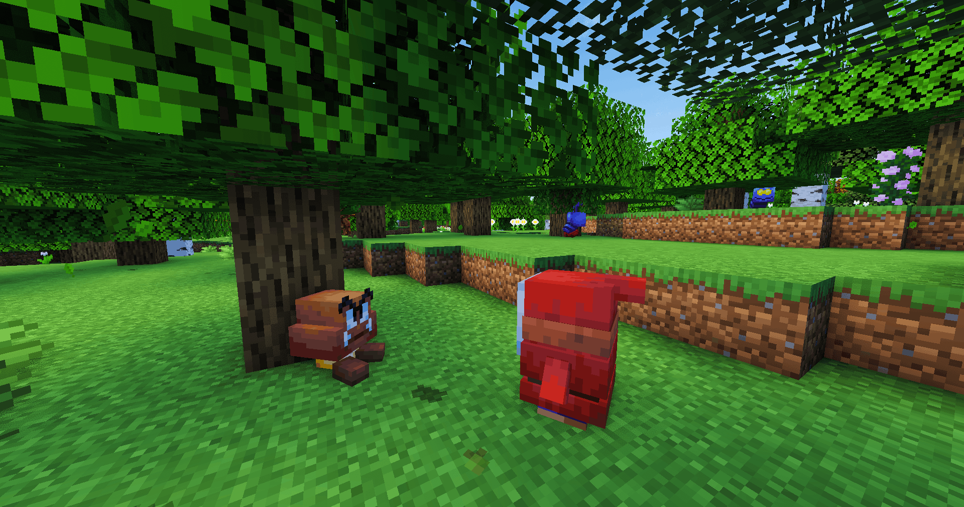 Goomba and Shy Guy in a forest; there are also Ant Troopers in the background!