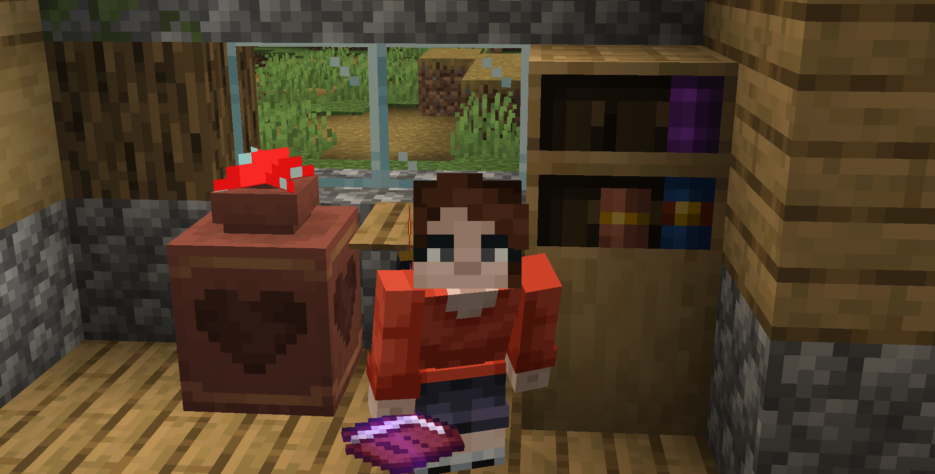 A minecraft player crouches and looks up at the camera. She's holding a written book, and standing next to a bookcase and a decorated heart-pattern pot with a mushroom inside.