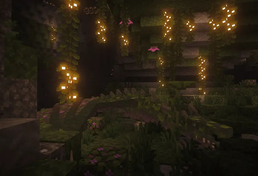 a green dragon with leafy hide sleeping in a lush cave