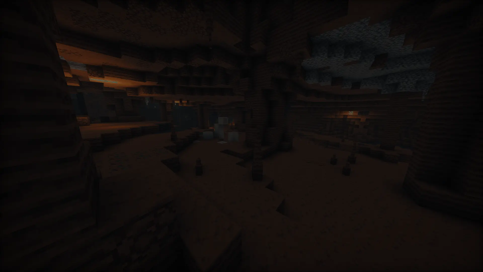 Lowe level of desert caves lined with a dark sandstone called deep sandstone. Deep sandstone stalagmites and stalactites are spread across the cave.