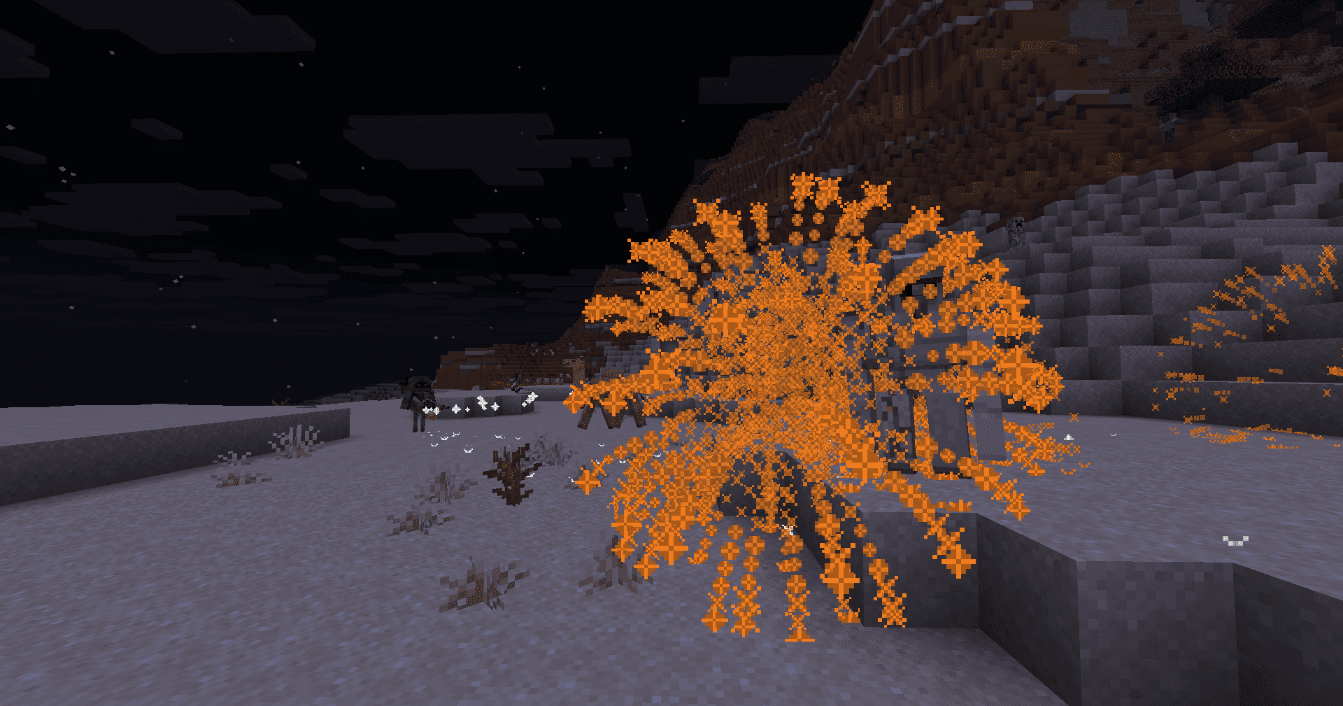 Pyro shooting fireworks at an iron golem, in a desert, at night