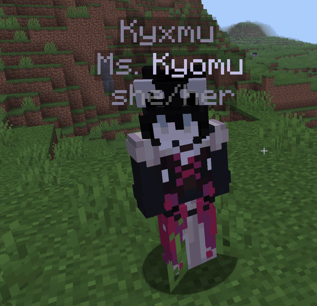 This is a screenshot showing a player with a nameplate above their head displaying three lines: their username "Kyxmu," a display name and honorific "Ms. Kyomu," and their pronouns "she/her."