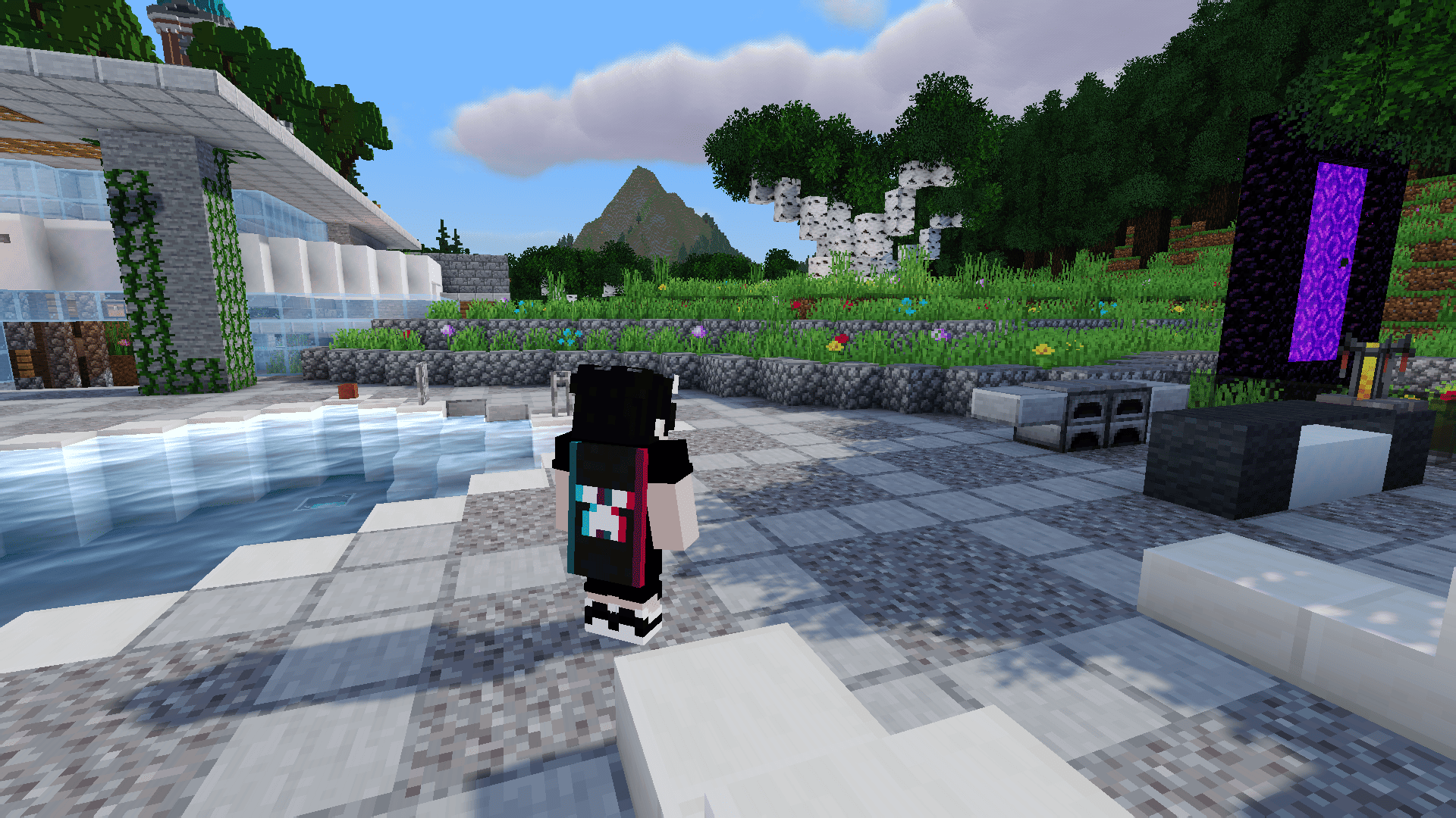 A screenshot with the shader active, featuring a mountain in the background next to a pool.