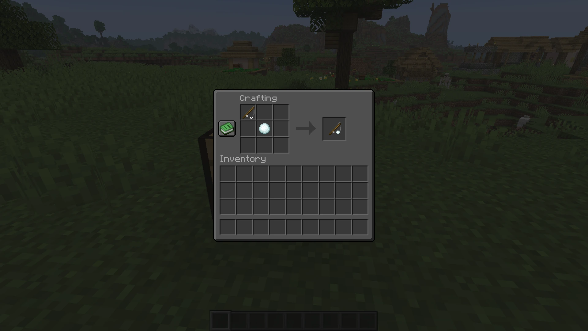 Screenshot of a  crafting table in which a fishing rod and a snowball are being combined into a snowball on a stick