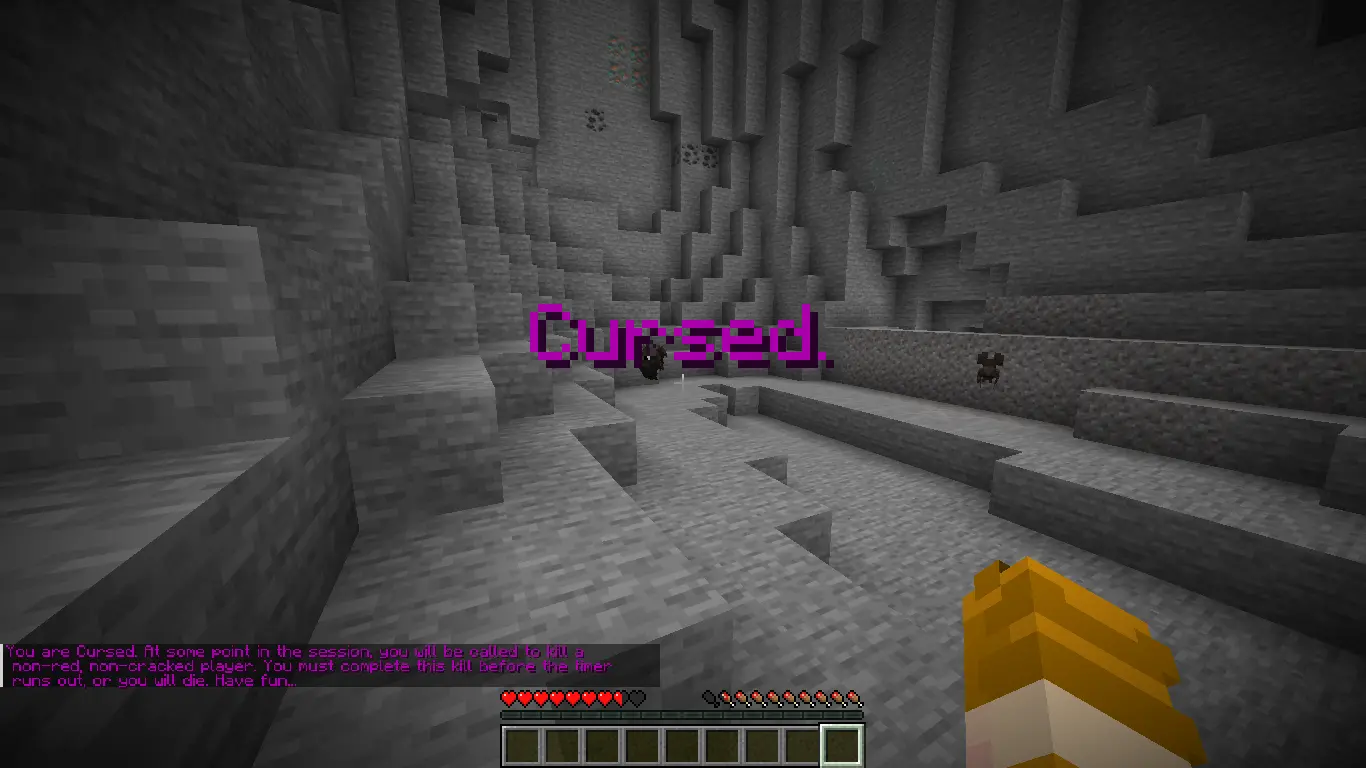 A title telling the player that they are Cursed in purple text.