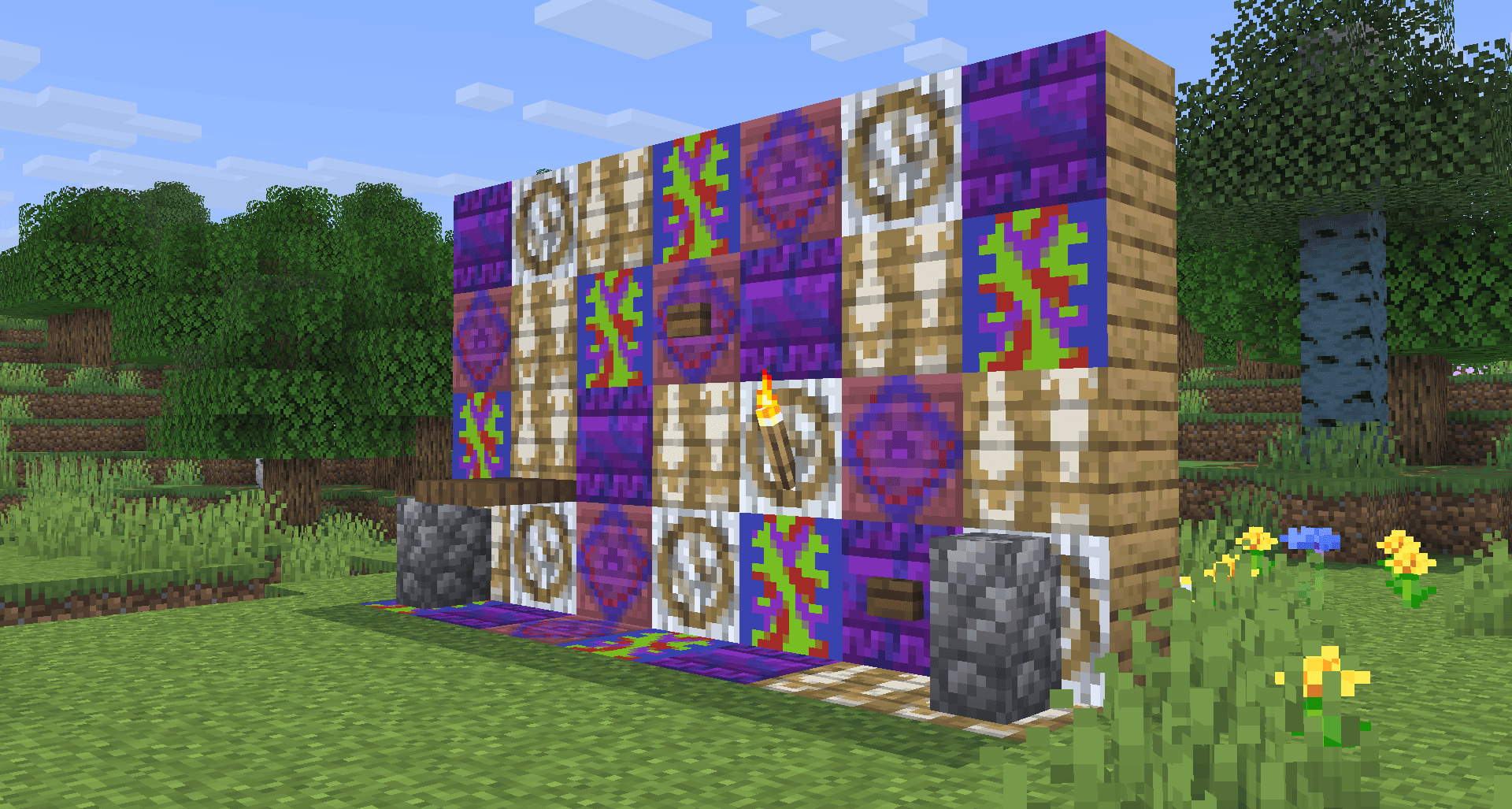 a bunch of wallpapers with different designs on oak planks. there is a torch, 2 buttons, a trapdoor, and 2 cobble walls against the wall.