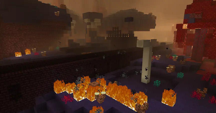 A Nether Fortress bridge running through the terrain of a obsidian dunes biome.