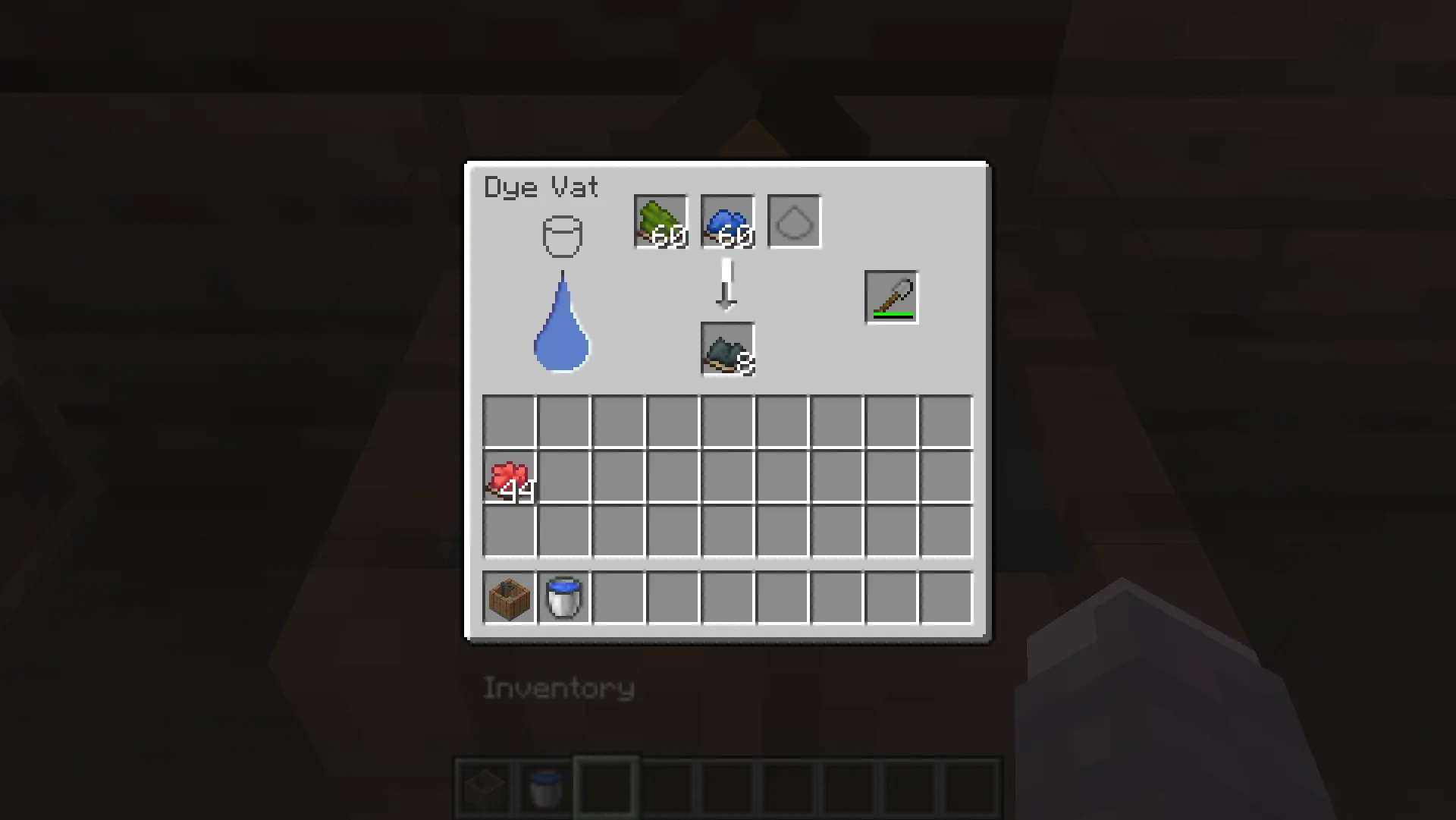 Same UI as before, but the water drop is full of blue. A green dye is in the first slot and a blue dye in the second slot, the arrow is half-filled with white now. The shovel slot has a stone shovel in it. The output slot has a mixed dye with a blue-greenish grey color