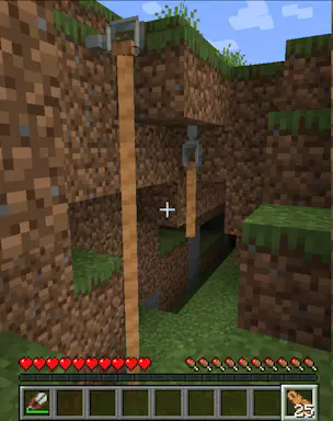 A picture of two ropes, one hanging from the side of a block and one hanging from the bottom of a block.