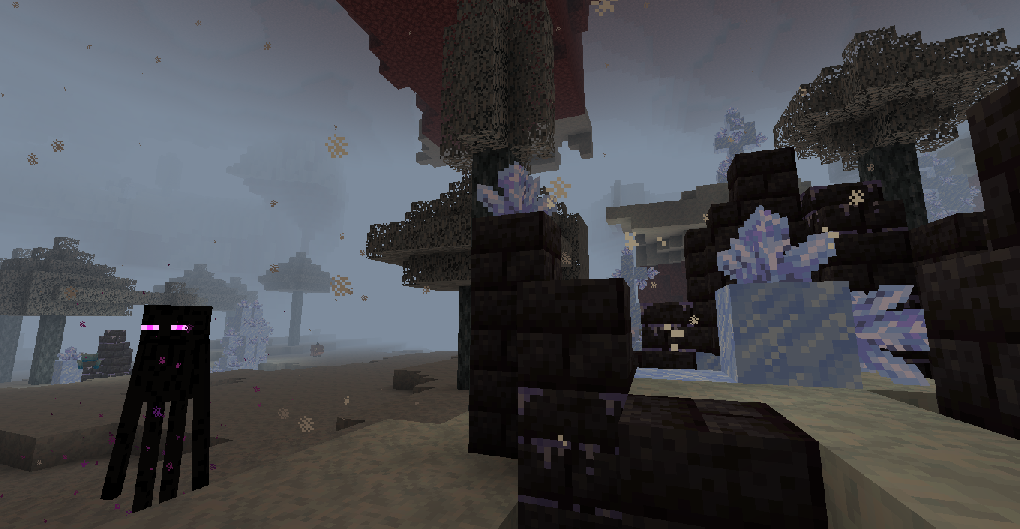 An enderman standing next to a frozen ruin in the Everfreeze Cirques