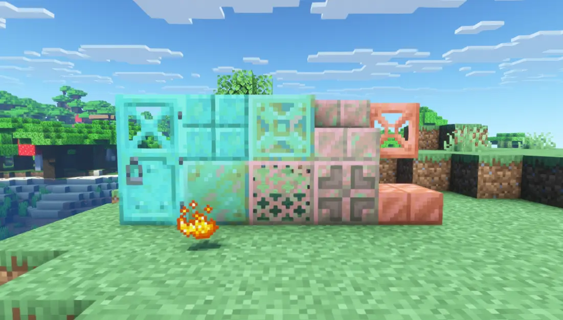 a collection of all current copper blocks at various oxidation stages, with some blaze powder next to them.