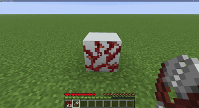 Player scrapes weeping vines off the side of a block, removing the texture from the block.