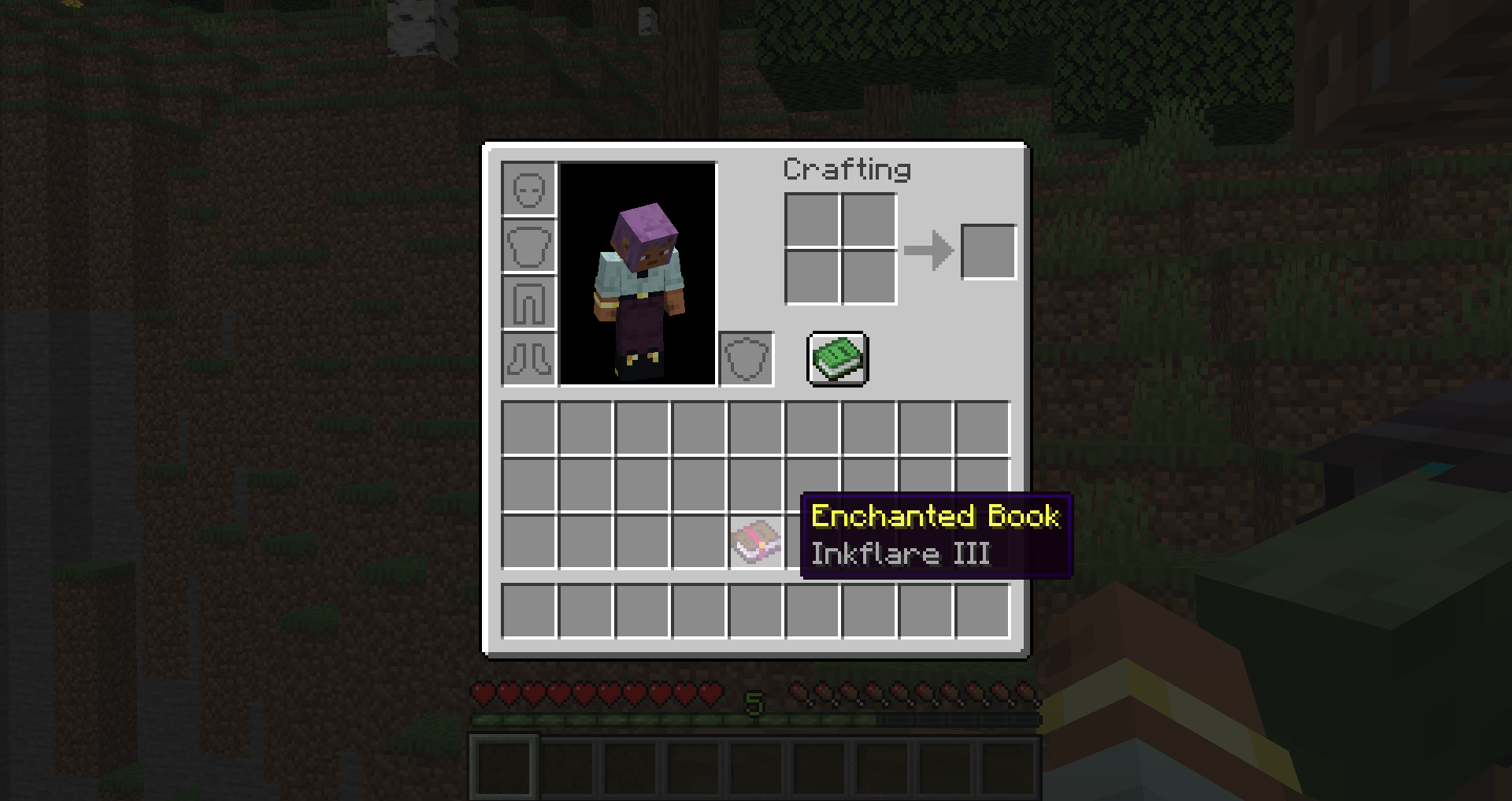 Player holds an enchantment book called "Inkflare III" in their inventory