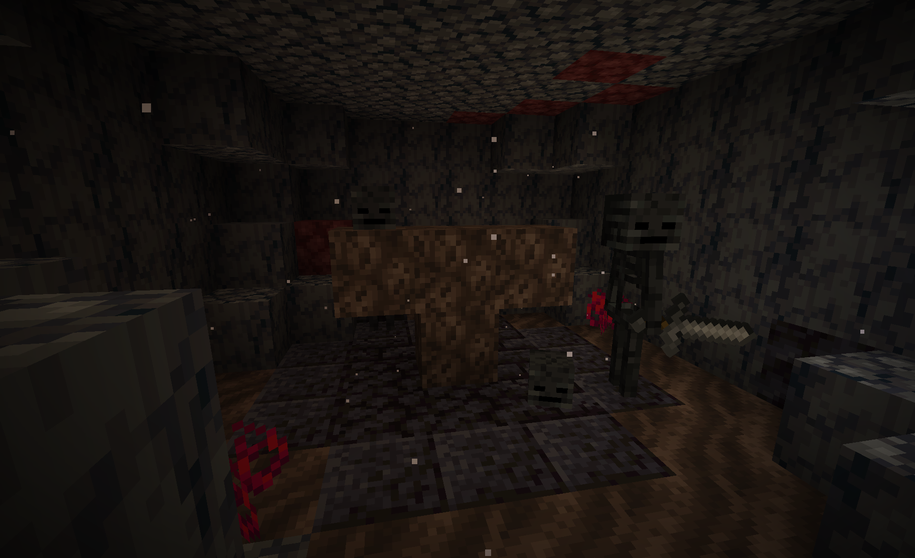 Underground room with partialy built Wither and two wither skeletons.