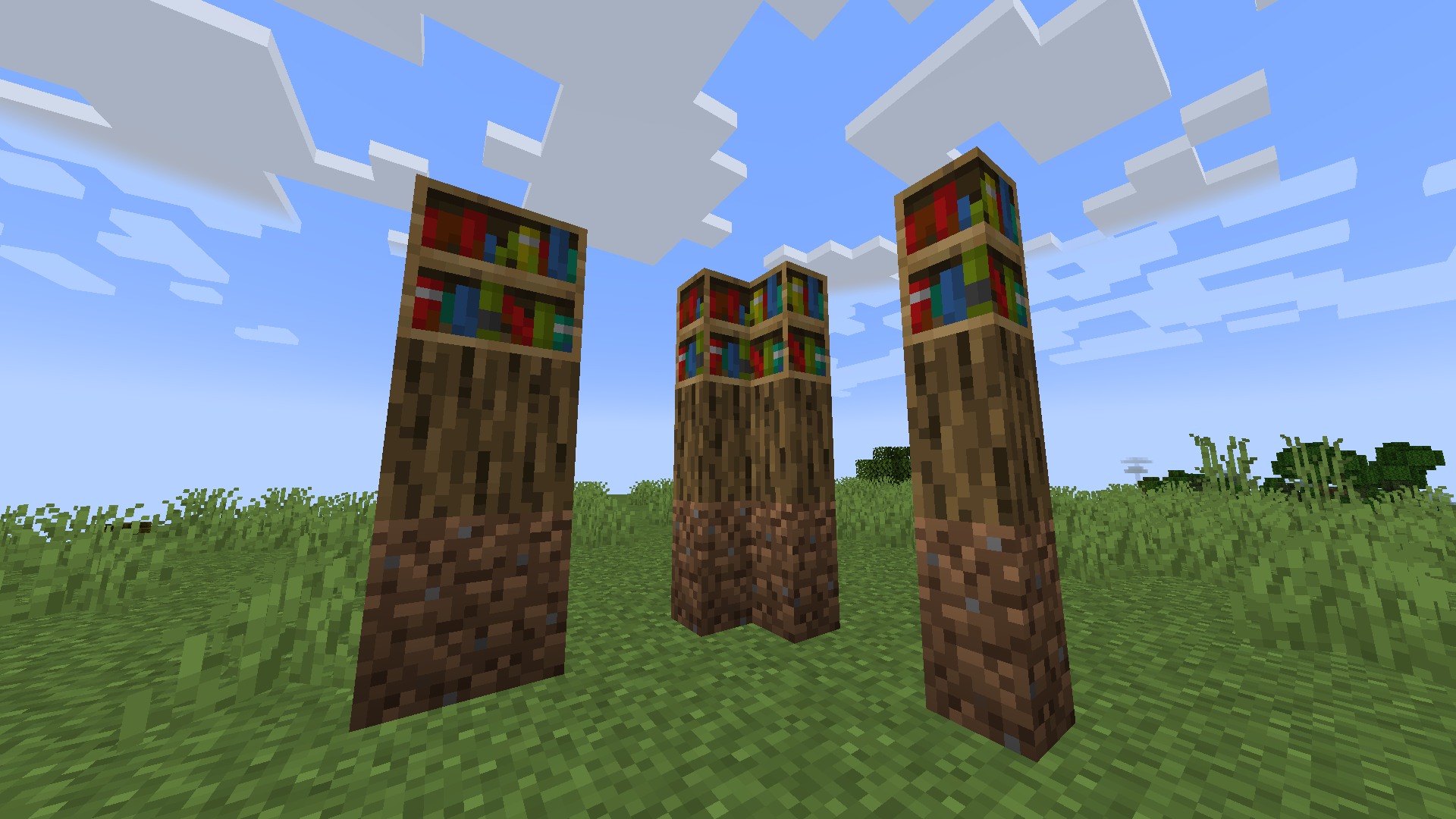 A couple types of block variants, dirt, oak log and bookshelf.