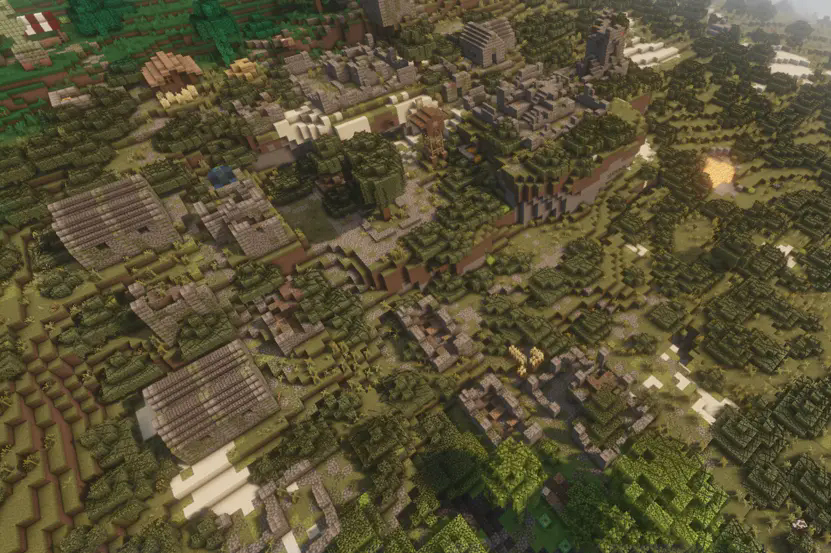A group of stone buildings, looking like a village.