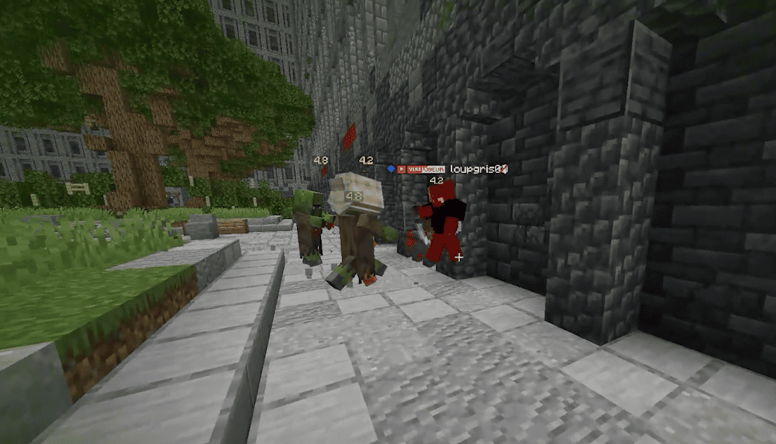 Picture of two zombies fighting against a human